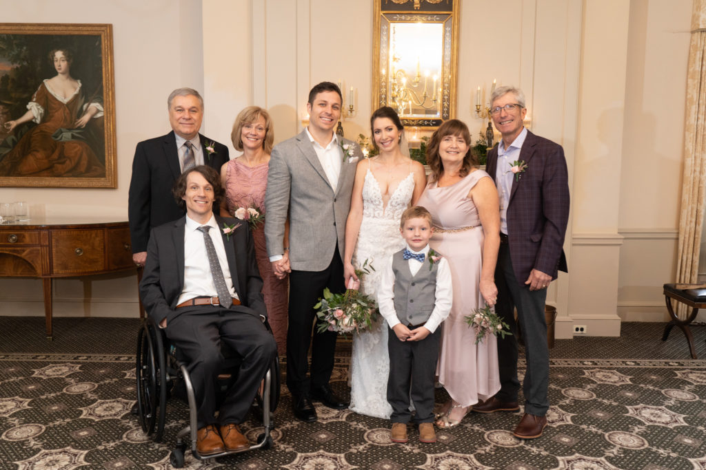 Family poses during micro wedding at the Colonial Williamsburg Inn, Virginia